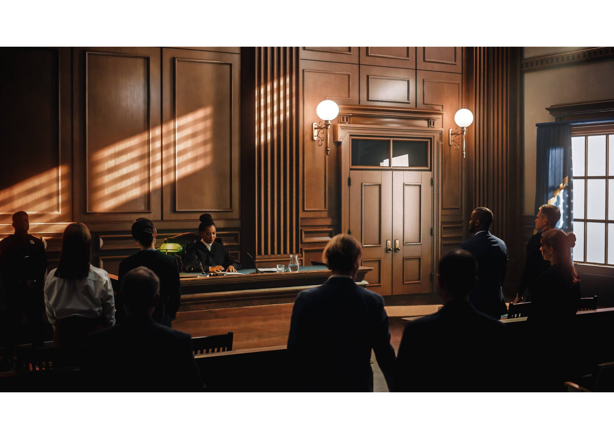 A legal trial taking place inside of a courtroom.