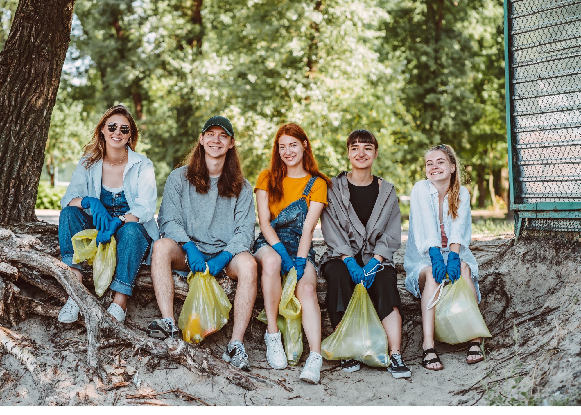A group of people after collecting garbage for Earth Day.