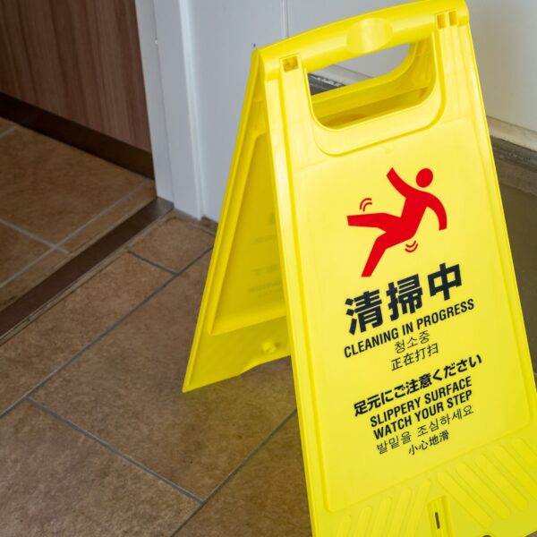 A beware of slippery surface sign